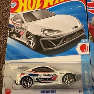 Lot of 7 Subaru hot wheels.